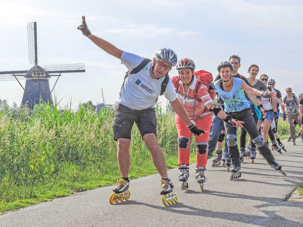 Foto Friday - roller skaters by a windmill