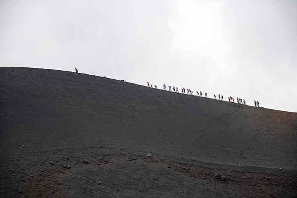 Foto Friday - silhouette of people walking along a distant ridge