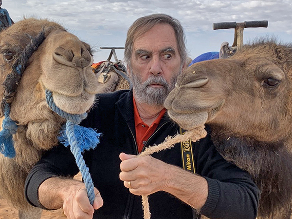 Foto Friday - a man with camels-