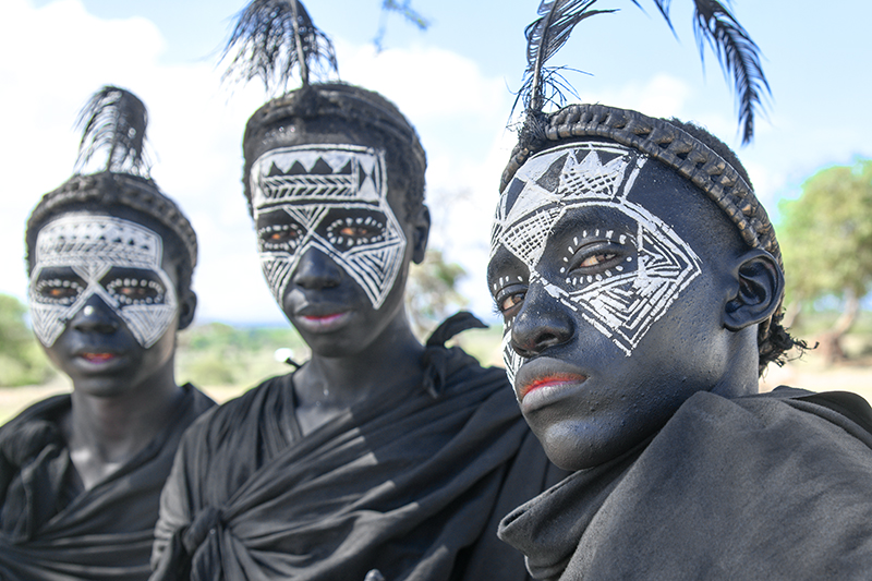 Foto Friday - African tribal boys with painted faces looking at the camera