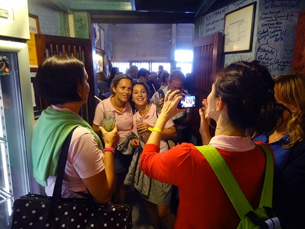 Foto Friday - women in a bar taking photos