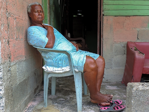 Foto Friday - a woman ina chair in a blue f=dress