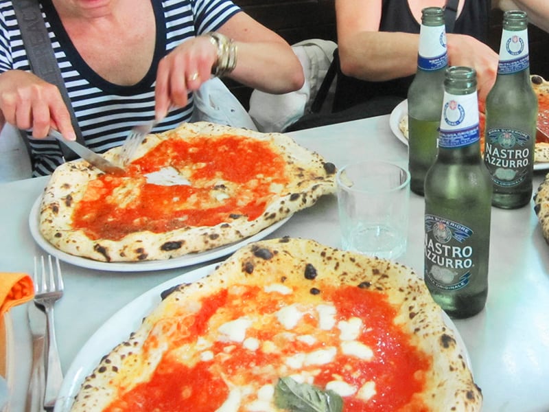 having a pie while searching for the best pizza in Naples