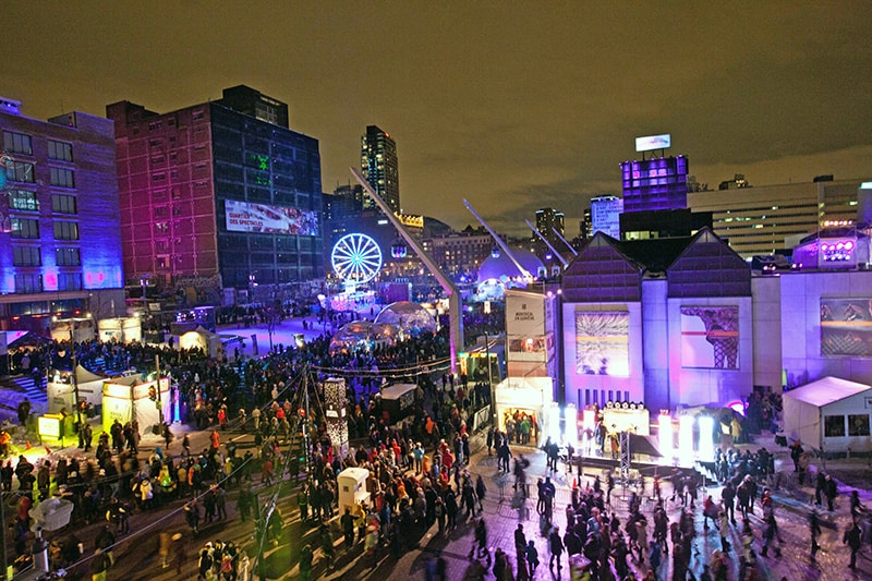 people in the street at one of Canada's winter festivals