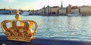 A golden crown on a bridge in Stockholm