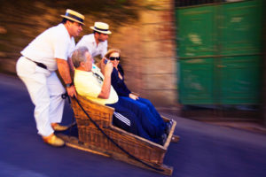 couple on a sled in Portugal