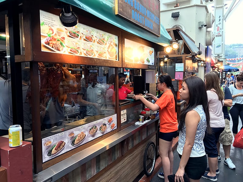 People at a hawker center in Singapore