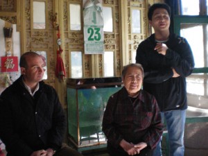 Speaking with a resident on a Beijing hutong tour