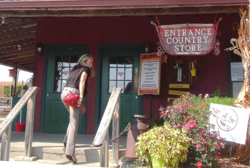 woman entering a country store, things to do in weston, mo