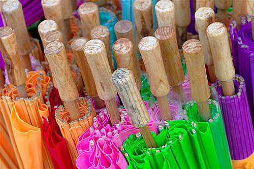 colorful umbrellas in a stand