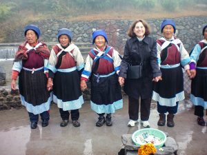 Marjorie with a group of Naxi women in Lijiang, China
