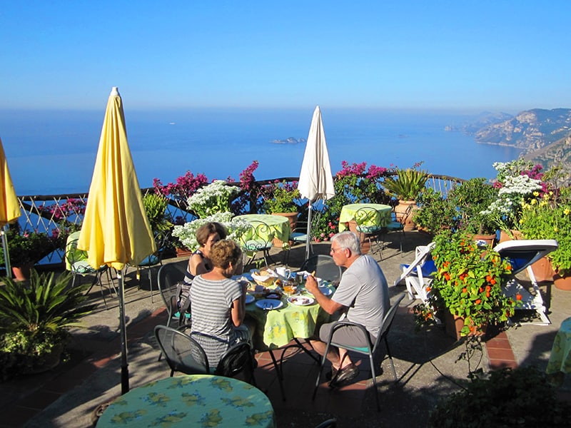 People having breakfast on a terrace in Nocelle