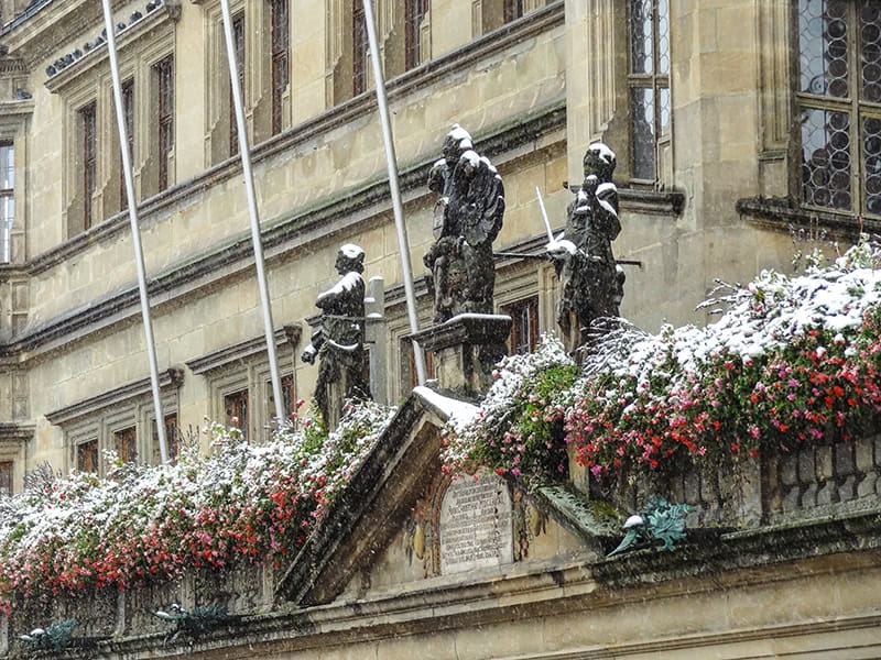 black statues on a building in Rothenburg Germany