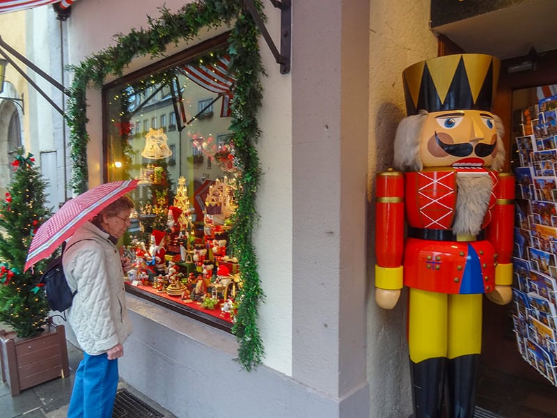 a large colorful wood soldier outside a shop in Rothenburg Germany