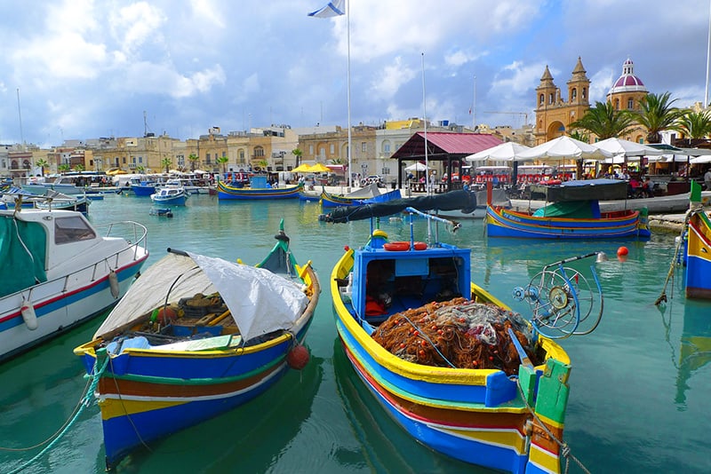 boats in a harbor in one of the small countries of the world