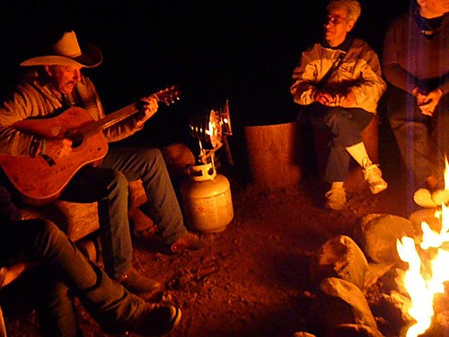 people around a camp fire on Cowboy Trail Rides