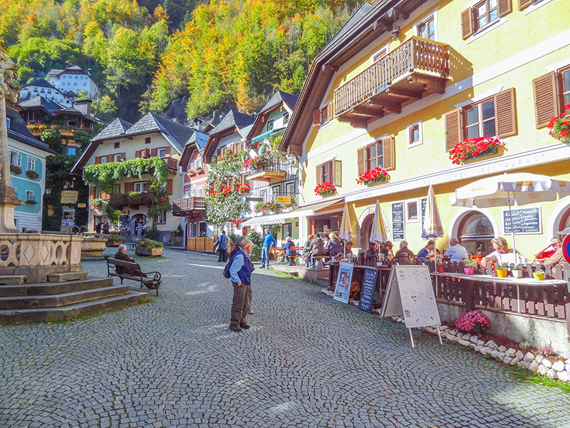 people in an outdoor cafe in Hallstatt