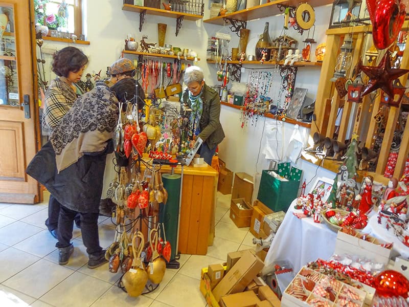 women shopping in a colorful store