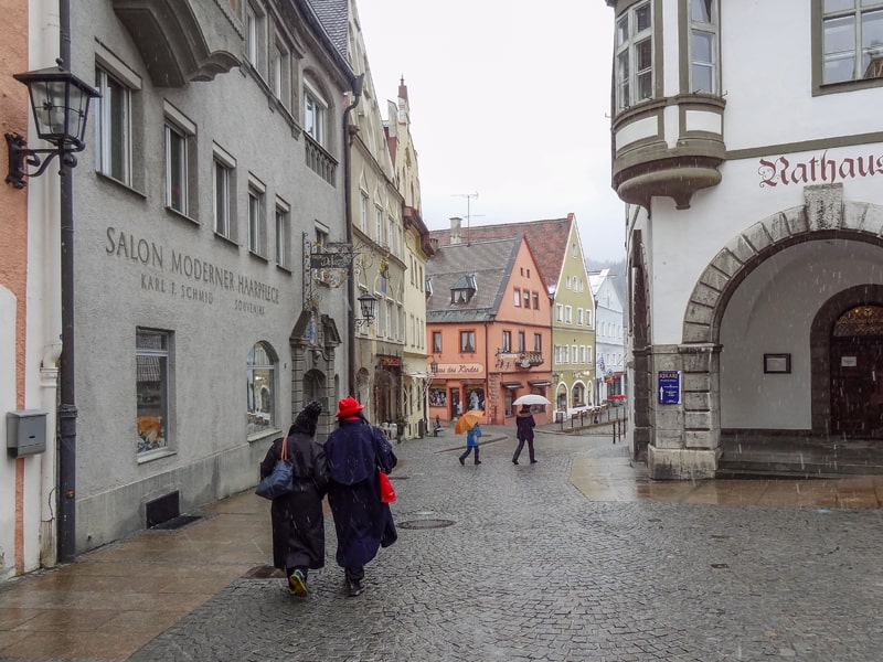 people on a street in Fussen