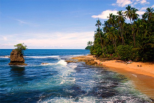 people lying on a beach, one of the things to do in Costa Rica