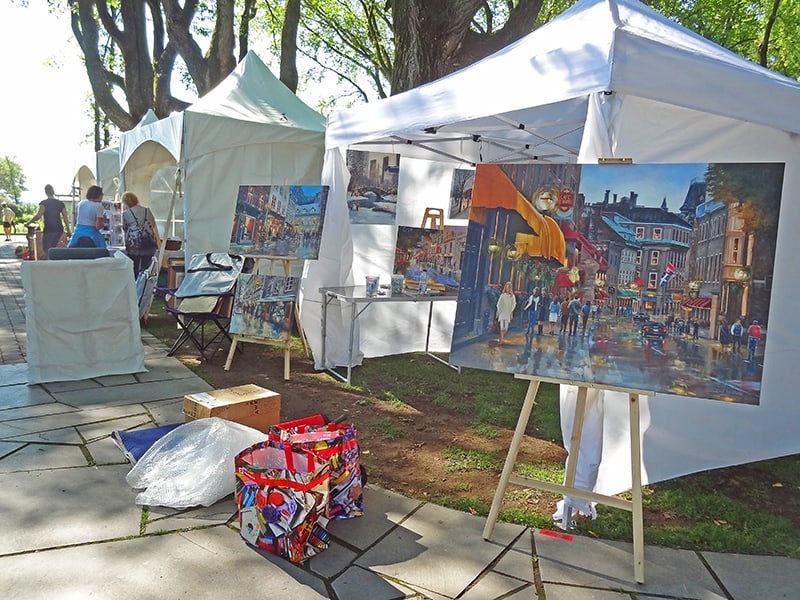 An art show in a park seen on a walking tour of Quebec City