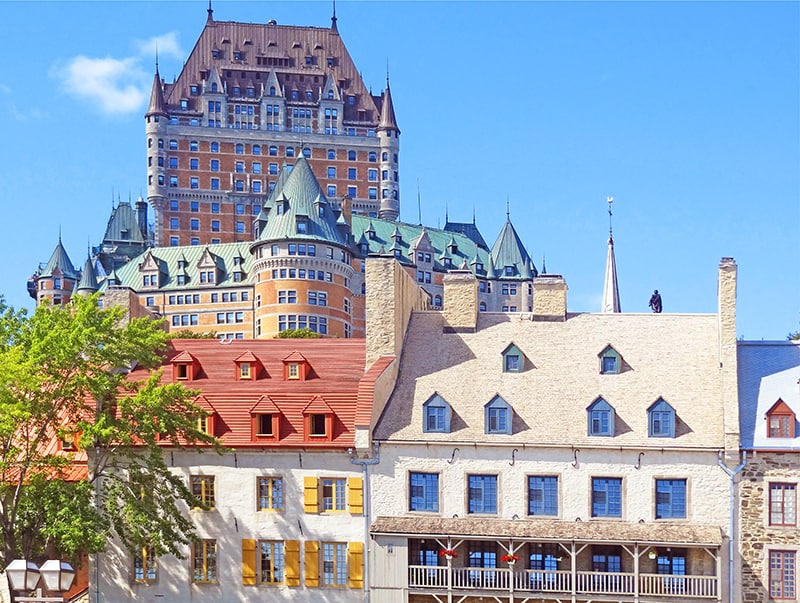 old buildings in front of a castle