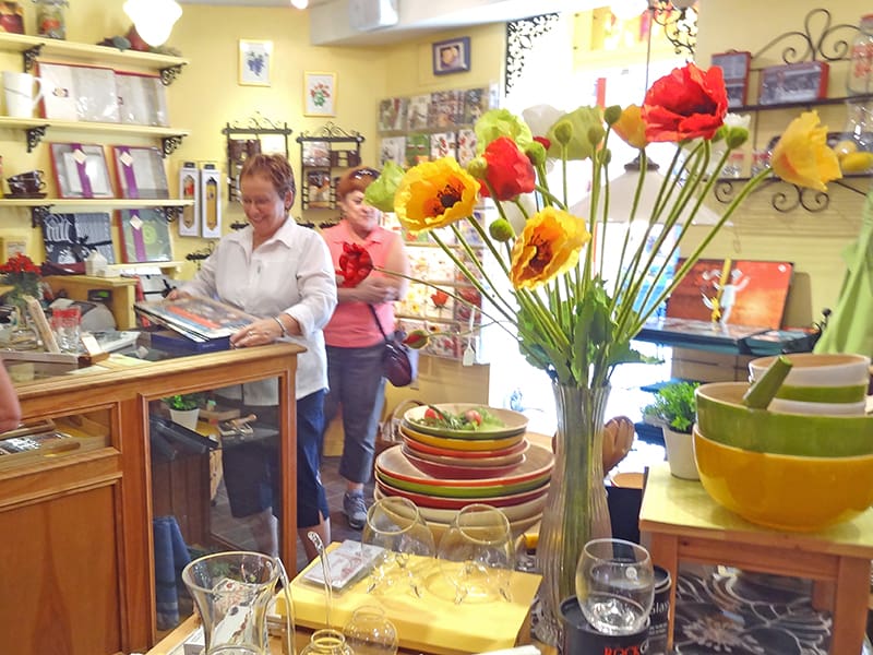 people in a colorful shop