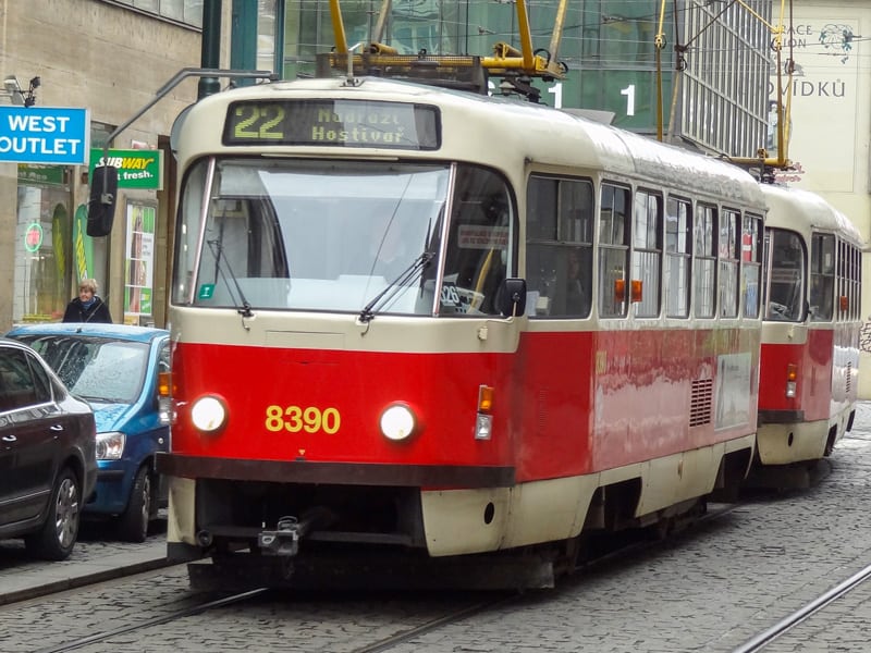a trolley on a cobblestone street