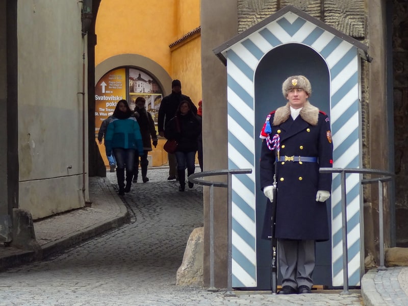 castle guards standing at attention in Prague in winter