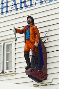 A ship figurehead on a building in Bergen, Norway