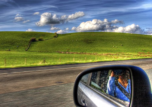 view of hills from a rental car in Europe