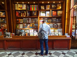 people in a long passage in Paris
