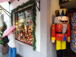 woman shopping off a Christmas market cruise