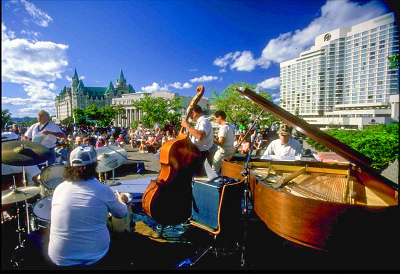 musicians in a park at a jazz festival