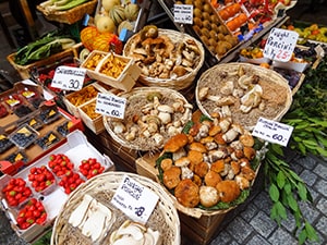 baskets of produce in a market, one of the best things to do in Lugano Switzerland