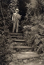 Mark Twain on the steps to his study in New York