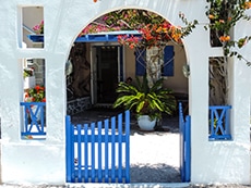 Entrance to a home near Firá seen while driving on the island - what to do in Santorini