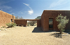 an adobe house on a desert