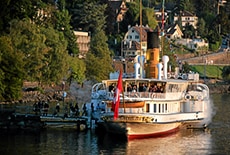 Boarding a boat for a day trip from Geneva