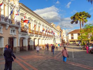 people wwaling in a square in Ecuador