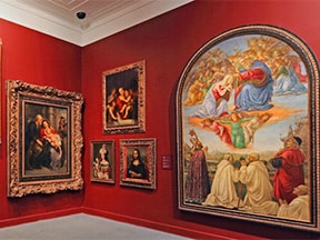 Paintings on a wall in a museum in Miami