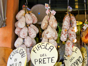 pork hanging at an Italian norcineria