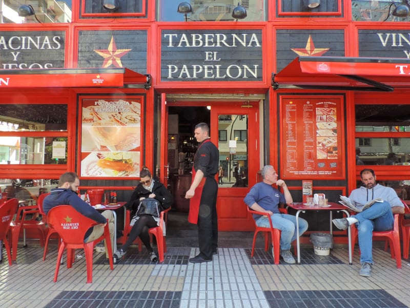 Relaxing outside a taberna, one of the things to do in Seville