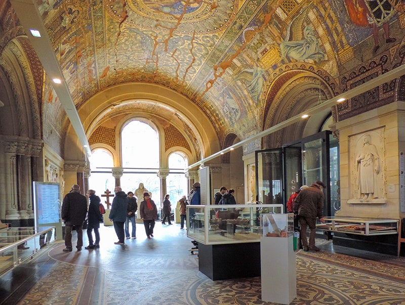 People looking at exhibits in a museum in Berlin