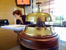 a bell on a hotel desk