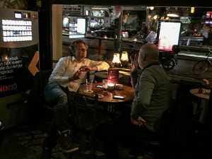 2 men at a table in a restaurant