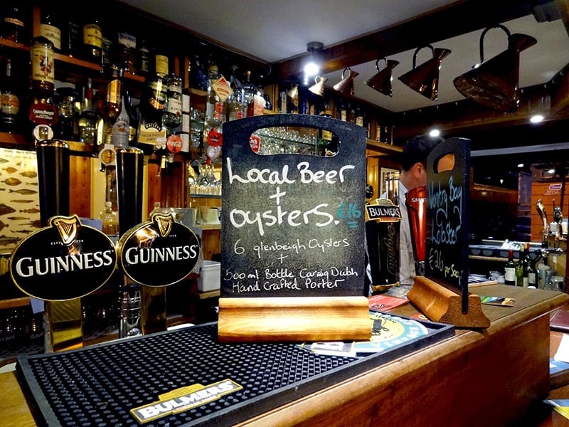 a chalk board on a counter - on the Dingle peninsula in Ireland