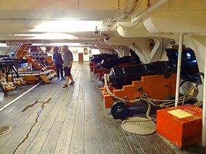 people below decl on an old ship in Boston