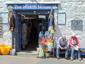 people in front of a shop