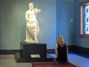 woman looking at a statue